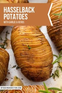 Close up of roasted hasselback potatoes garnished with fresh rosemary sprigs. Text overlay includes recipe name.