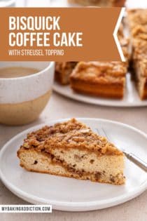 Slice of bisquick coffee cake on a white plate. A cup of coffee and more cake is visible in the background. Text overlay includes recipe name.