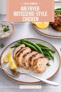 Sliced air fryer rotisserie chicken breast on a plate with green beans and lemon wedges. Text overlay includes recipe name.