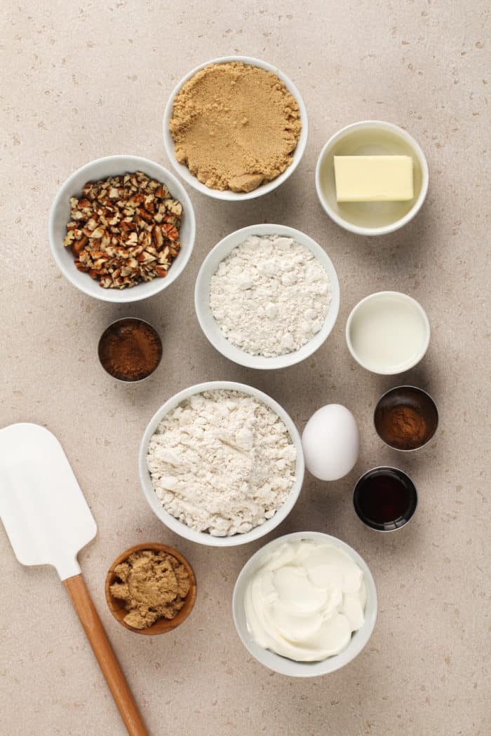 Ingredients for bisquick coffee cake arranged on a beige countertop.