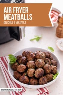 Bowl of air fryer meatballs on a countertop in front of an air fryer. Text overlay includes recipe name.