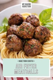 Close up of several air fryer meatballs set on top of a bed of spaghetti. Text overlay includes recipe name.