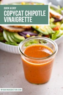 Jar of chipotle vinaigrette set in front of a white bowl of salad. Text overlay includes recipe name.