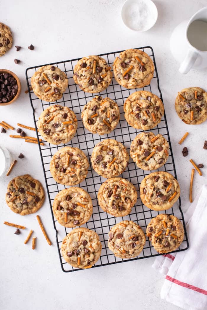 Overhead view of kitchen sink cookies cooling on a wire rack.