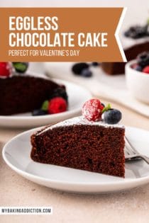 Slice of eggless chocolate cake, topped with powdered sugar and berries, on a white plate. Text overlay includes recipe name.