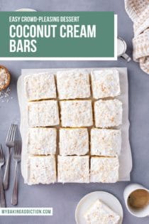 Overhead view of sliced coconut cream bars set on a piece of parchment paper. Text overlay includes recipe name.
