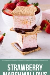 Two s'mores made with strawberry marshmallows stacked on top of each other. Text overlay includes recipe name.