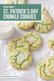 Several green crinkle cookies next to a glass of milk on a piece of parchment paper. Text overlay includes recipe name.