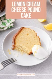 Slice of lemon cream cheese pound cake with a bite taken from it next to a dollop of whipped cream on a white plate. Text overlay includes recipe name.