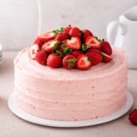 Frosted and decorated strawberry layer cake.