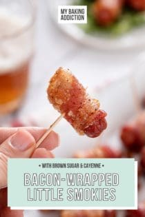 Hand holding up a bacon-wrapped little smokie on a toothpick. Text overlay includes recipe name.