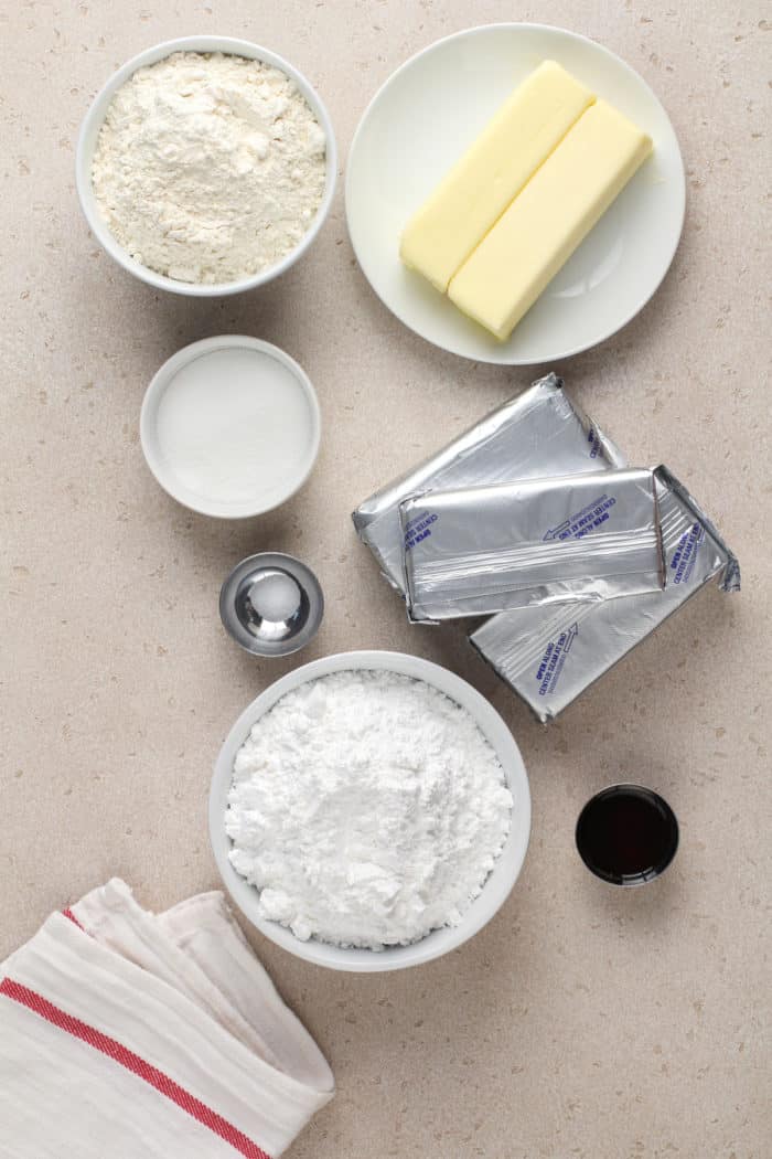 Ingredients for nana's easy cheesecake arranged on a countertop.