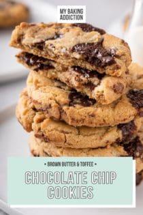 Stack of chocolate chip cookies with brown butter and toffee. the top cookie is broken in half, showing the melty chocolate chips and gooey inner texture. Text overlay includes recipe name.