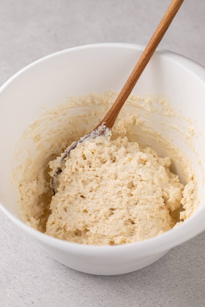 Buttermilk drop biscuit batter in a white mixing bowl.