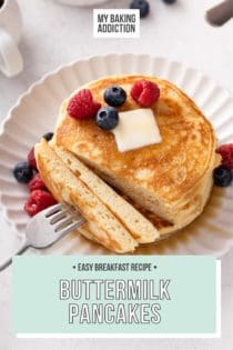 Overhead view of plated buttermilk pancakes with a bite cut off and on the fork that is next to the pancakes. Text overlay includes recipe name.