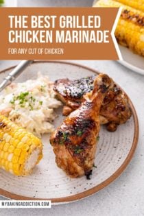 A grilled chicken drumstick and thigh arranged on a plate next to grilled corn and coleslaw. Text overlay includes recipe name.