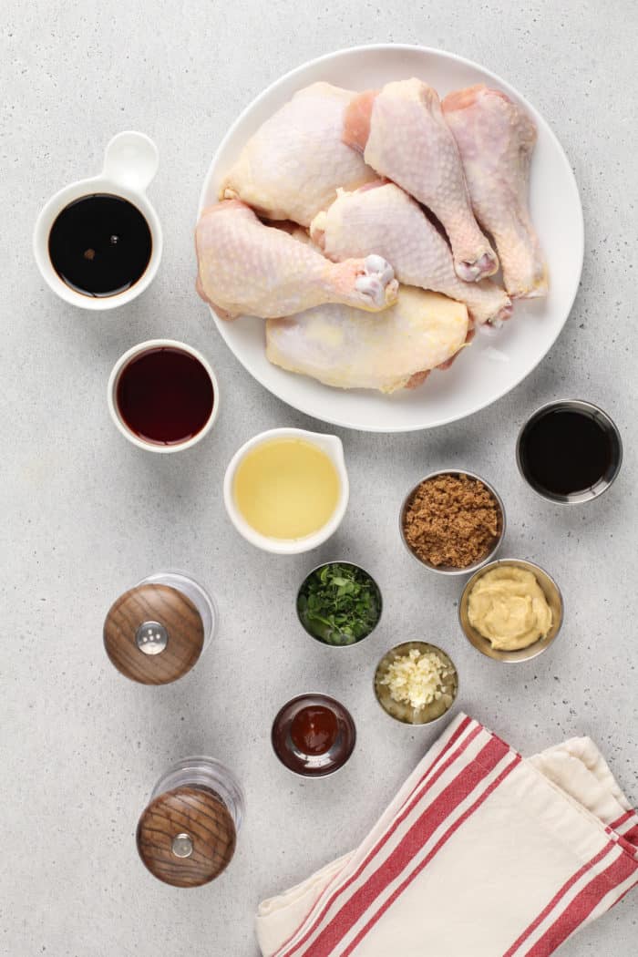 Ingredients for the best grilled chicken marinade arranged on a gray countertop.