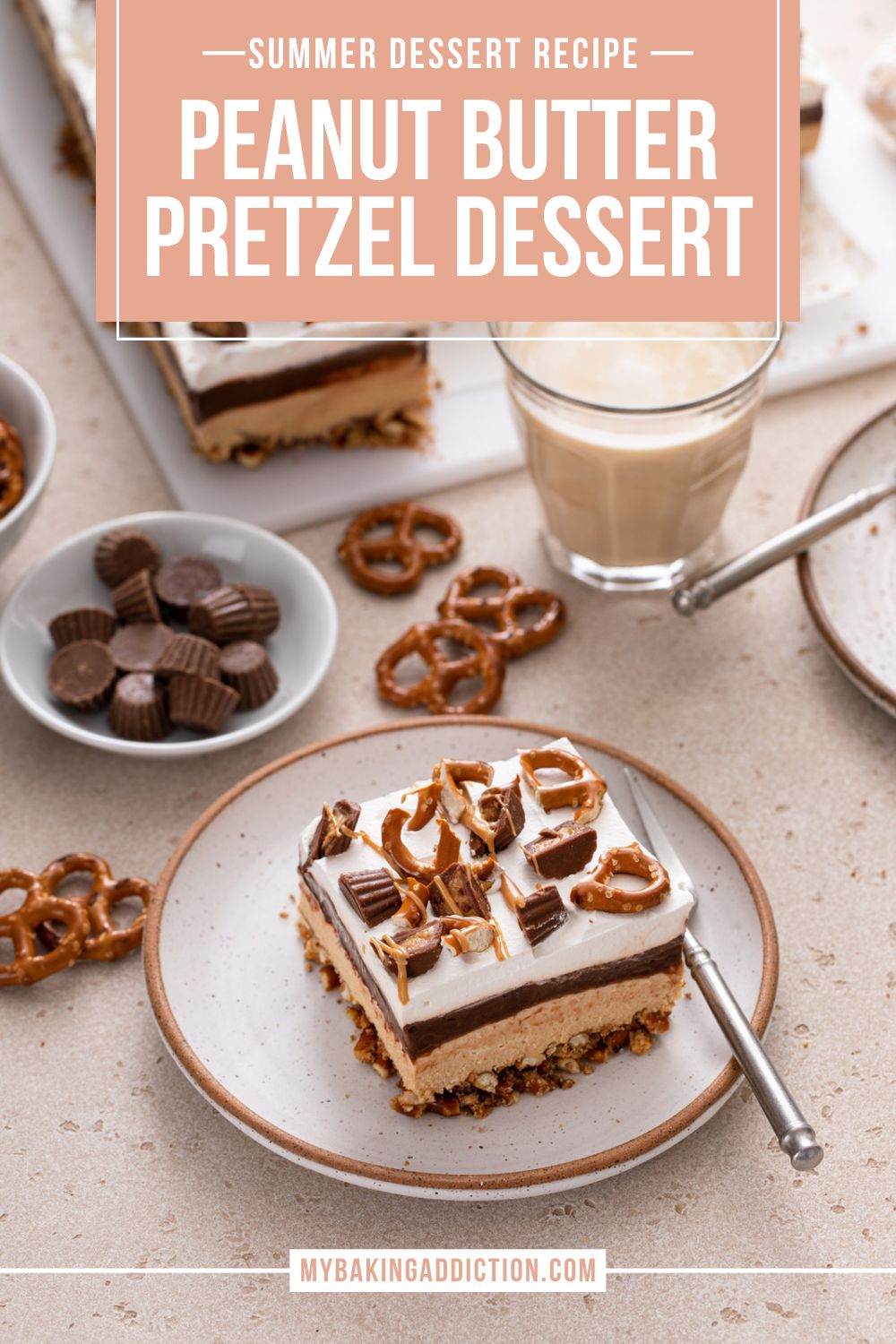 Plated slice of peanut butter pretzel dessert with a cup of coffee and more of the dessert in the background. Text overlay includes recipe name.