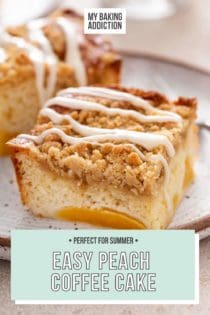 Two slices of easy peach coffee cake on a speckled plate. The bottom of a glass of milk is faintly visible in the background. Text overlay includes recipe name.