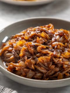 Bowl filled with caramelized onions.