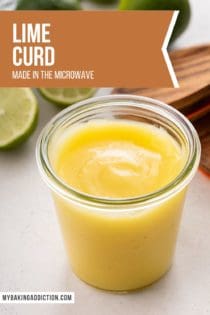 Glass jar filled with lime curd. Fresh limes are visible in the background. Text overlay includes recipe name.
