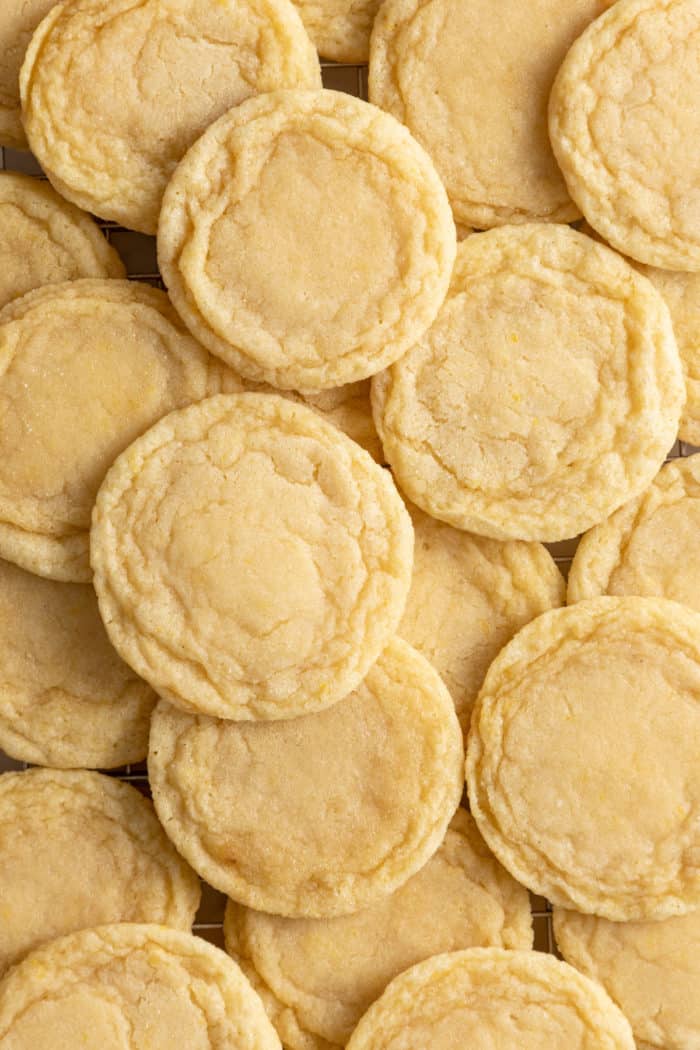 Perfectly round sugar cookies in a neat pile.