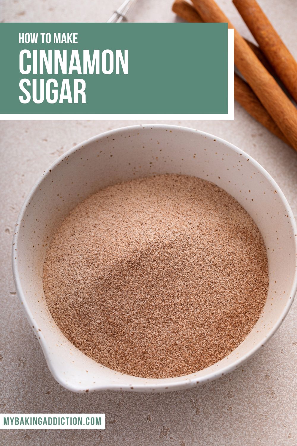 Cinnamon sugar in a small white bowl. text overlay includes tutorial name.