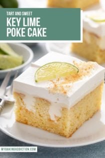 Slice of key lime poke cake garnished with a lime slice on a white plate. text overlay includes recipe name.