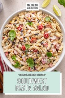 Overhead view of a large, white serving bowl filled with southwest pasta salad. text overlay includes recipe name.