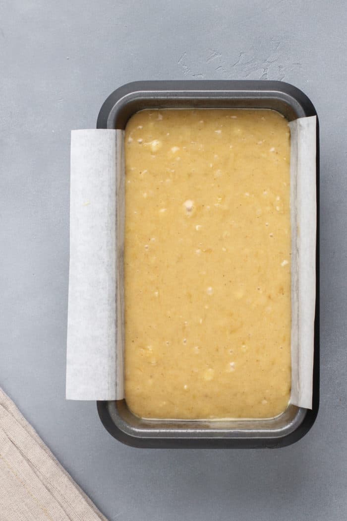 Batter for brown butter banana bread in a loaf pan.