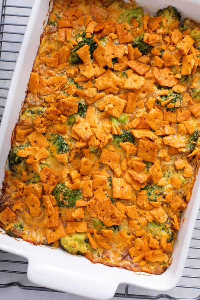Overhead view of baked broccoli casserole in a white baking dish.