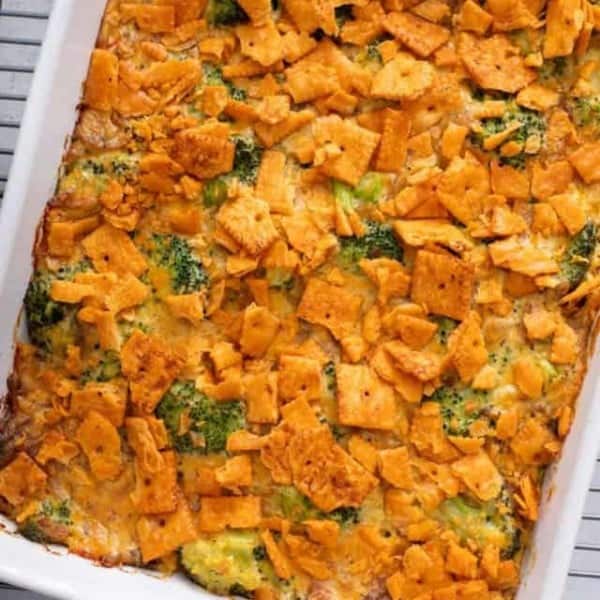 Overhead view of baked broccoli casserole in a white baking dish.