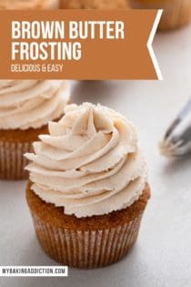 Two cupcakes topped with brown butter frosting next to a piping bag filled with the frosting. Text overlay includes recipe name.