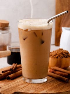 Glass filled with iced shaken espresso.