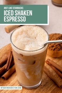 Image of shaken espresso in a tall glass showing the frothy top of the espresso. Text overlay includes recipe name.