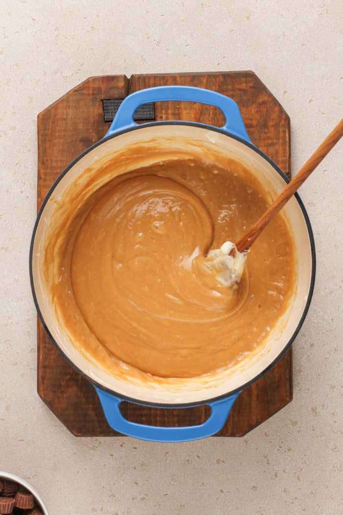 Melted peanut butter and marshmallow mixture in a large dutch oven.