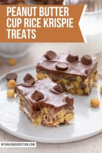 Two peanut butter cup rice krispie treats on a plate. A bite has been taken from the corner of the treat closest to the camera. Text overlay includes recipe name.