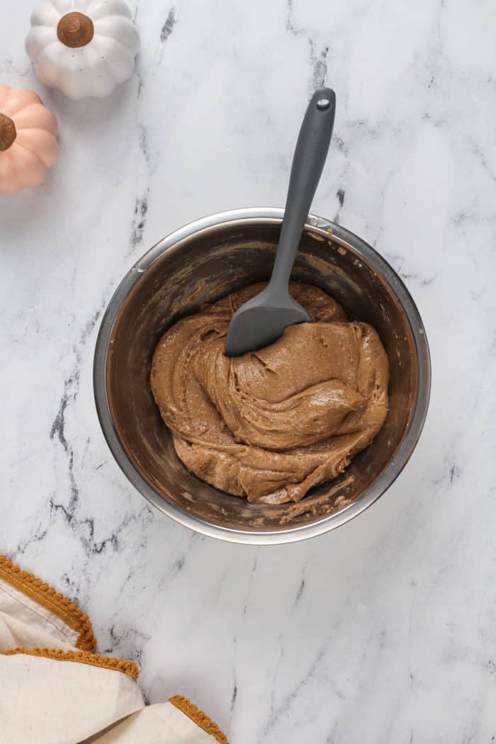 Spice cake dough for crust of pumpkin gooey butter cake.