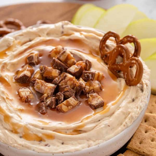 Close up image of snickers dip in a bowl.