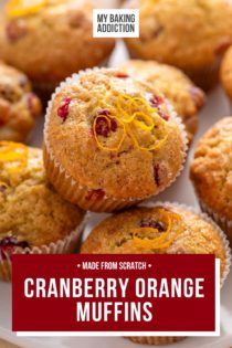 Close up of cranberry orange muffins arranged on a white platter. Text overlay includes recipe name.