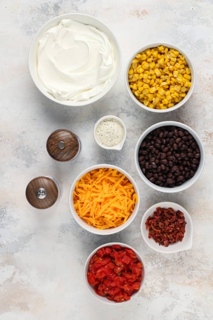 Ingredients for fiesta ranch dip arranged on a countertop.