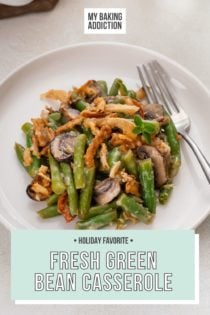 White plate filled with fresh green bean casserole next to a fork. Text overlay includes recipe name.