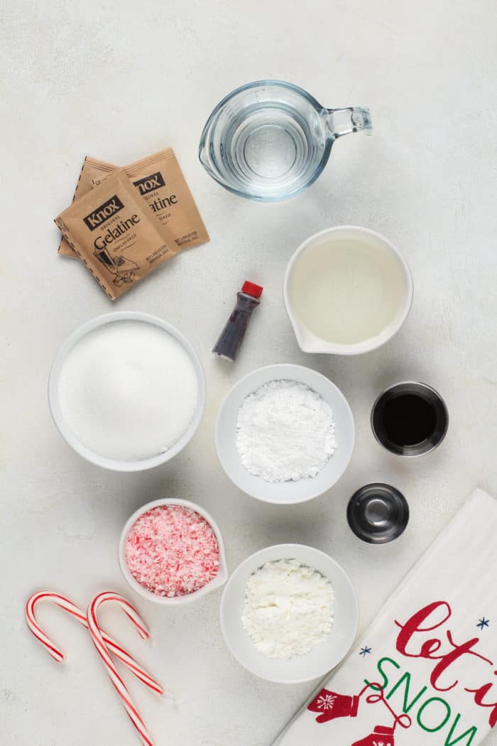 Ingredients for peppermint marshmallows arranged on a white countertop.