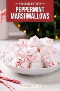 Homemade peppermint marshmallows piled into a white bowl. Text overlay includes recipe name.