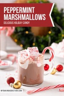 Mug of hot chocolate topped with peppermint marshmallows, with a bowl of the marshmallows in the background. Text overlay includes recipe name.