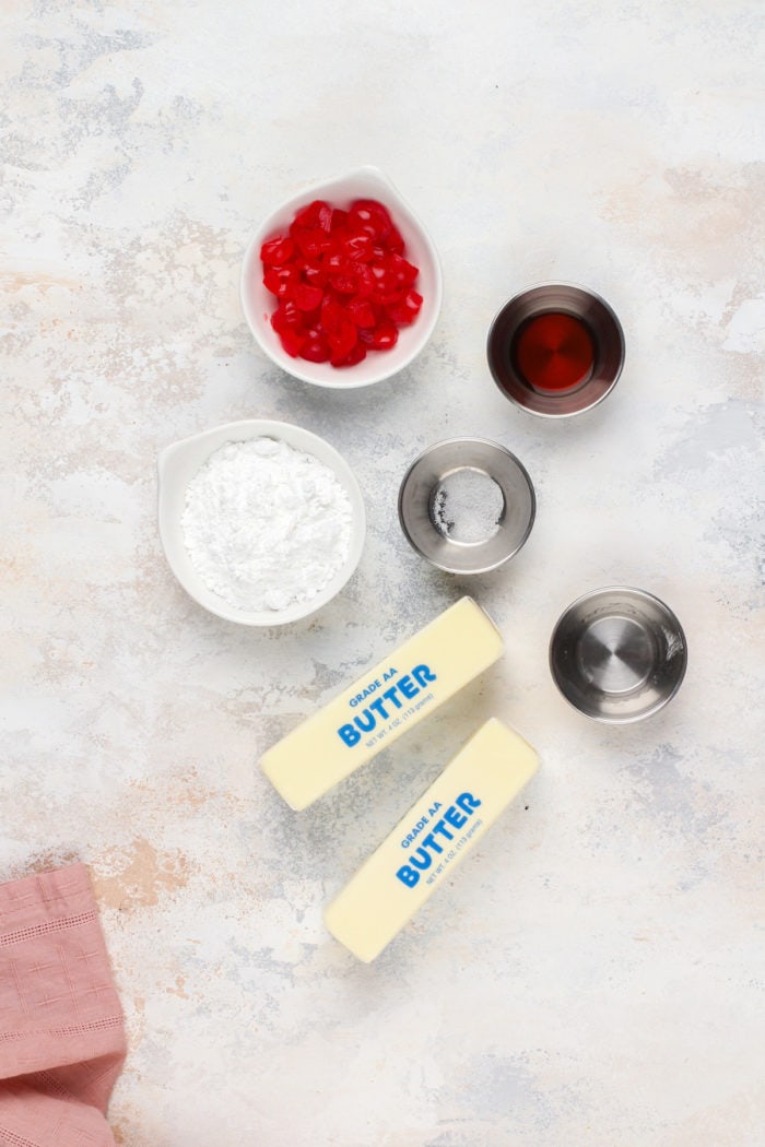 Ingredients for whipped cherry butter arranged on a countertop.