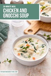 White bowl filled with chicken and gnocchi soup. A second bowl is set on a wooden board in the background. Text overlay includes recipe name.