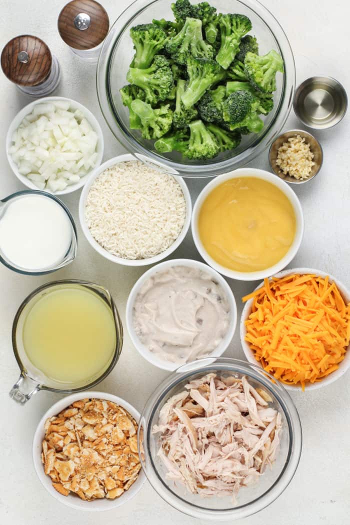 Chicken broccoli rice casserole ingredients arranged on a countertop.
