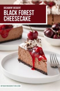Slice of garnished black forest cheesecake next to a fork on a white plate. Text overlay includes recipe name.