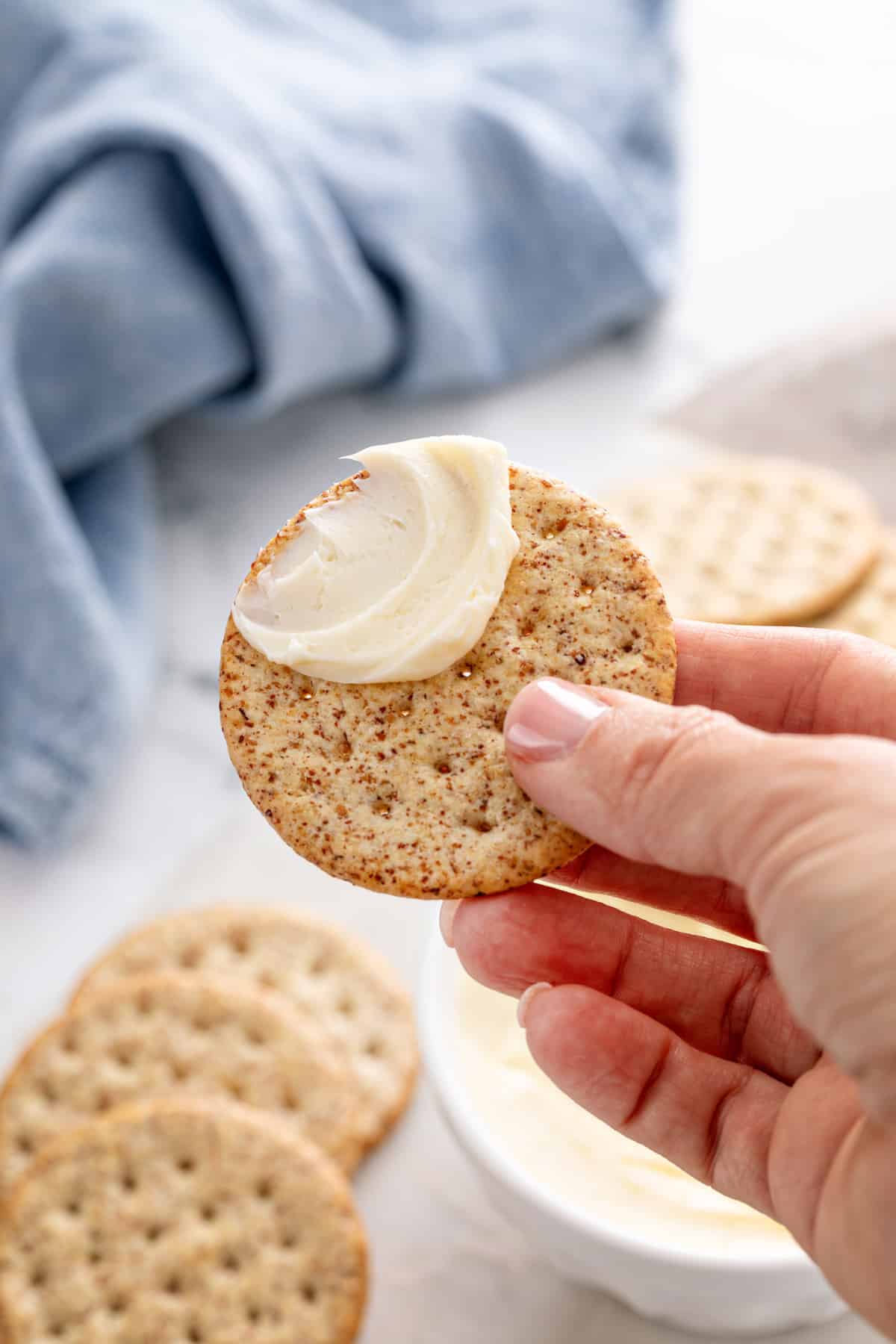 Homemade butter spread on a cracker.